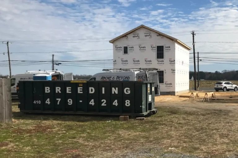 image of roll off dumpster at construction site