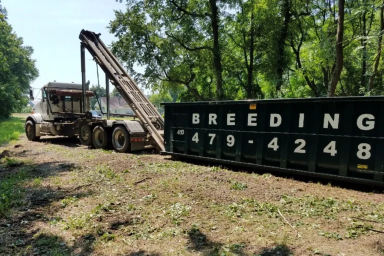 image of roll off truck delivering container (1)