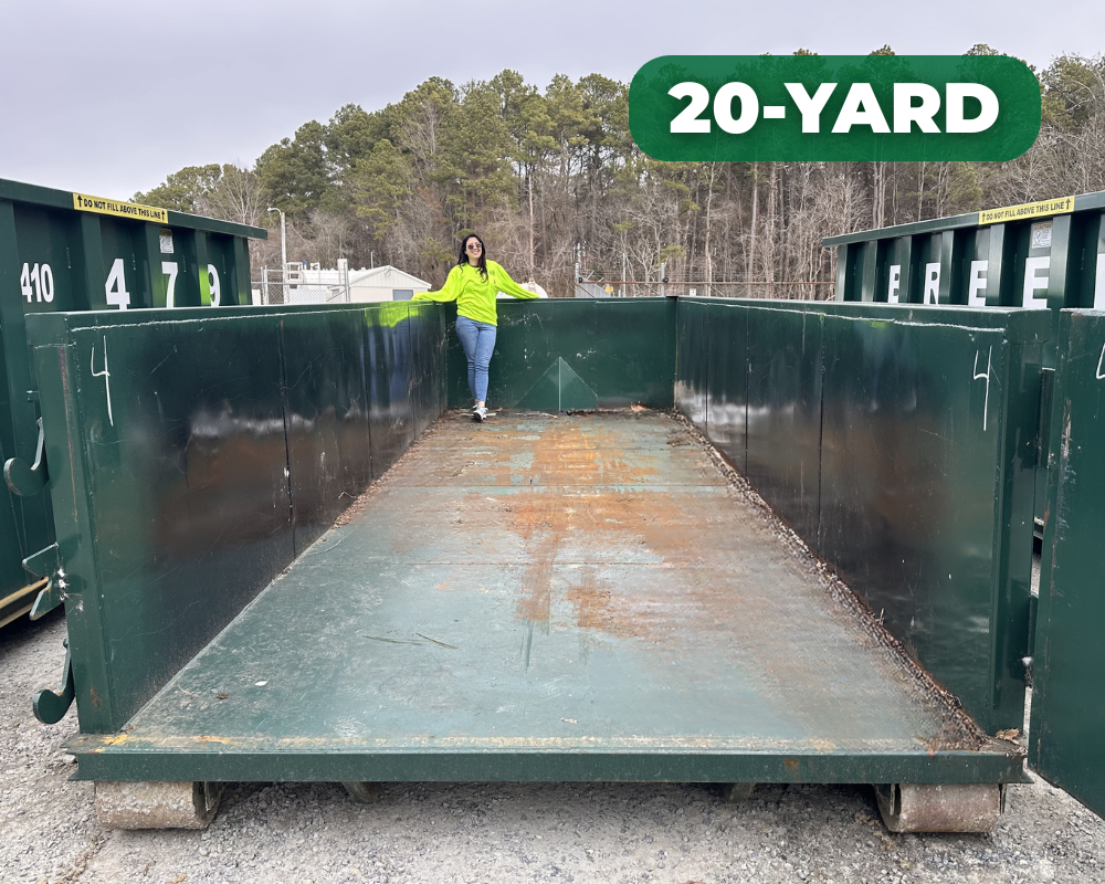 jen inside a 20 yard dumpster