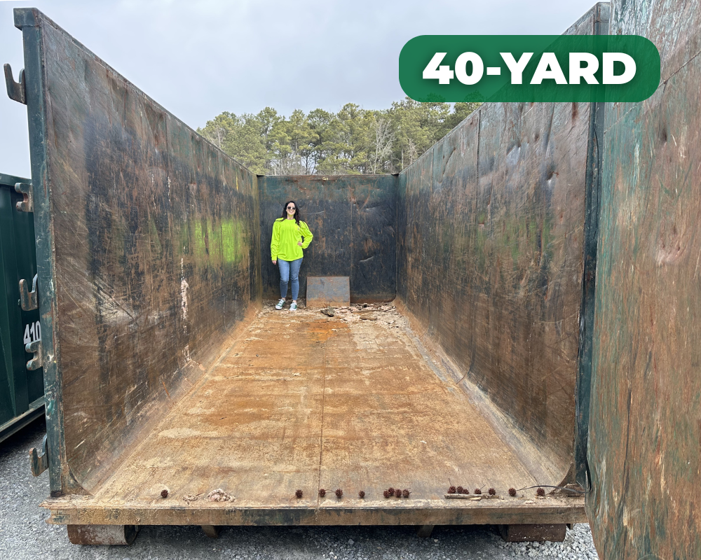 jen inside a 40 yard dumpster